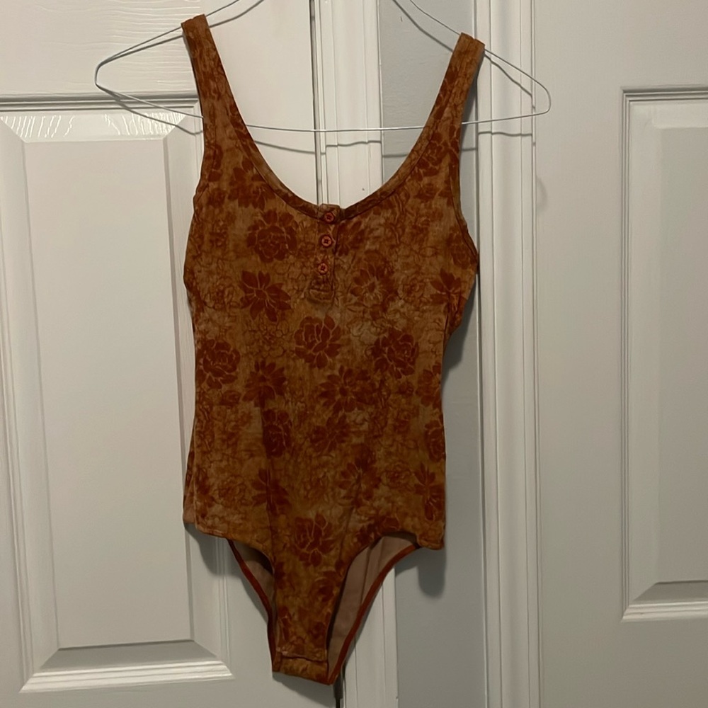 Orange flower bodysuit